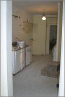 The hallway/temporary kitchen